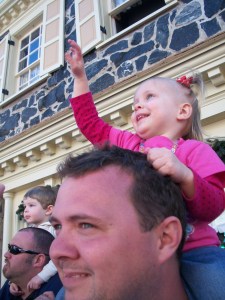 Sweet Girl waving to the princesses.  