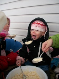 Teagan really Liked the Ice Cream, much better than the snow itself.