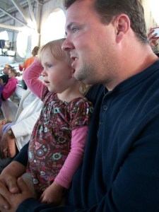 Teagan watching the show with Daddy